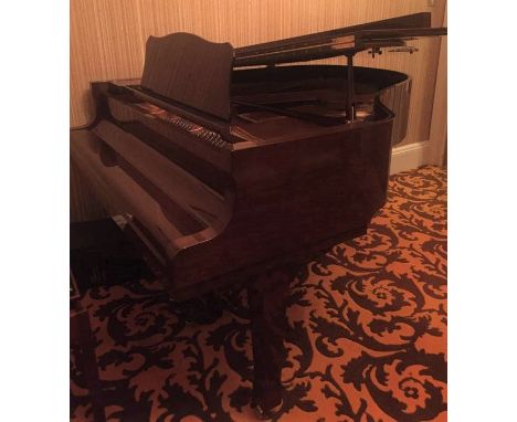 Yamaha (c2004)A 5ft 8in Model C2 grand piano in a bright American walnut case; together with a matching stool. 
