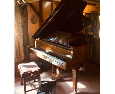 Steinway (c1961)A 6ft 11in Model B grand piano in a bright mahogany case on square tapered legs; together with an adjustable 