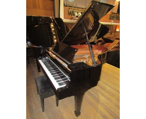 Steinway (c2002) LATE ENTRYA 5ft 10in Model O grand piano in a bright ebonised case; together with a stool.  