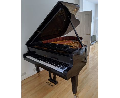 Schimmel (c1989)A 5ft 8in Model E174T grand piano in a bright ebonised case on square tapered legs; together with an adjustab