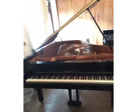 Yamaha (c1967) AMENDMENT (c1999)A 6ft 11in Model C6 grand piano in a bright ebonised case on square tapered legs.