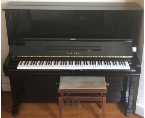 Yamaha (c1984)A Model U3 upright piano in a bright ebonised case; together with a stool.