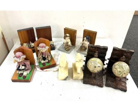 Selection of vintage and later book ends includes horse, doll, globe etc 