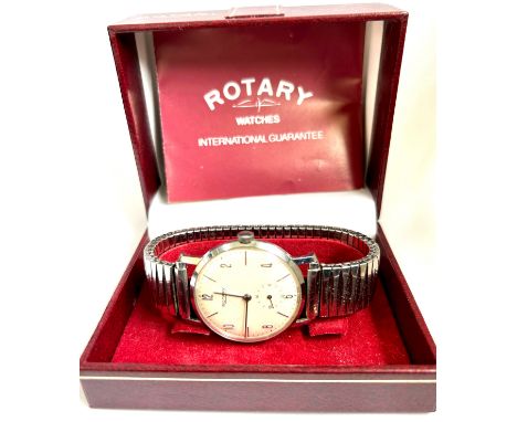Vintage boxed mens silver coloured Rotary wristwatch, winds and ticks, however no warranty given 