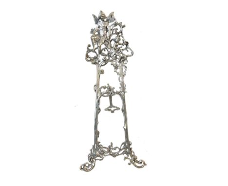Vintage ornate metal easel, measures approximately 58cm tall 
