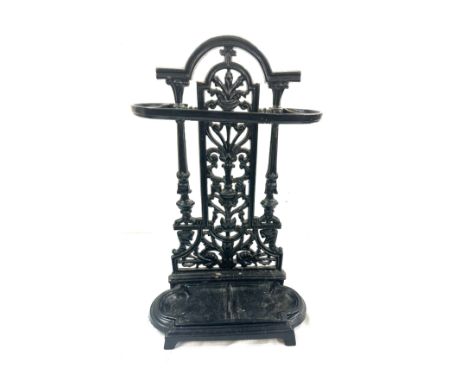 Vintage metal stick stand 23 inches tall 