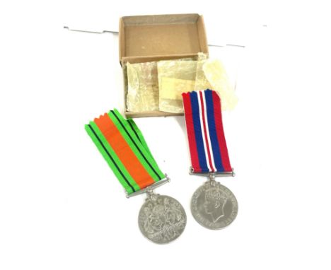 2 Vintage WW2 medals includes The Defence Medal, both with original ribbons 