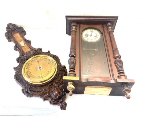 Antiqued carved barometer and a 2 key hole wall clock 