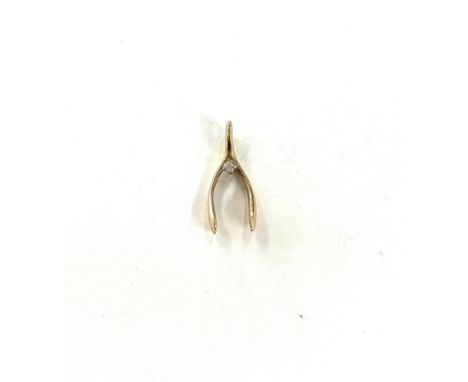 Vintage 9ct gold charm wishbone weighs approx 1.9 gm 
