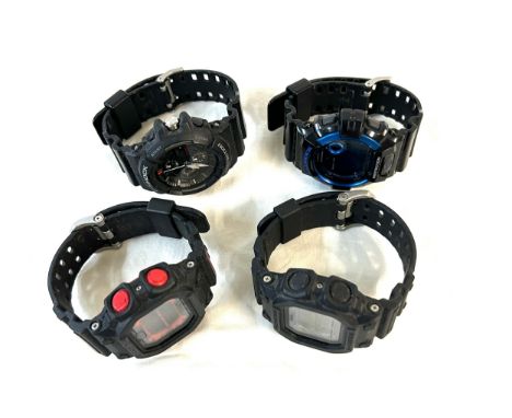 Selection of 4 casio G Shock wrist watches includes G-8900A, 52777, gx56bb, GX-56, untested 