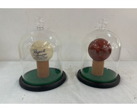 2 Vintage cased cricket and tennis balls includes Regent and Gualantead 