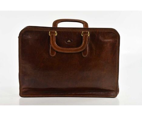 THE BRIDGE; a tan leather briefcase, with top handles and zip closure to top, with brass hardware embossed with maker's logo,
