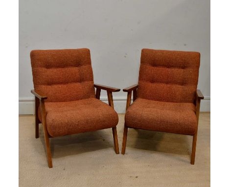 A pair of mid century style elbow chairs upholstered in a red button back material (2).