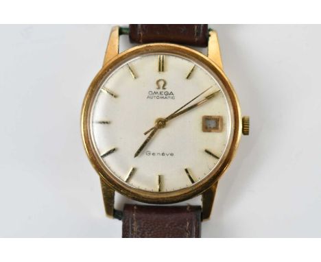 OMEGA; a gentleman's vintage 9ct gold automatic wristwatch, with baton markers and date aperture to the circular dial, with 2
