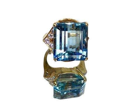 BOUCHERON; a fine 18ct yellow gold aquamarine and diamond ring, the rectangular step cut aquamarine weighing 19.18ct, with se