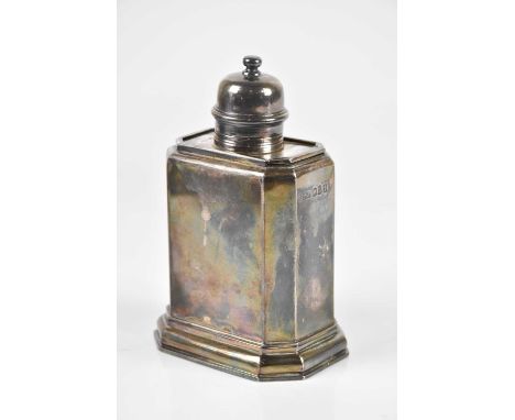 CRICHTON BROTHERS; a George V hallmarked Britannia silver tea caddy of shaped rectangular form, with panelled body, removable