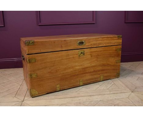 A 19th century camphor wood trunk, with brass corner mounts, 49.5cm, width 103cm, depth 27cm.  