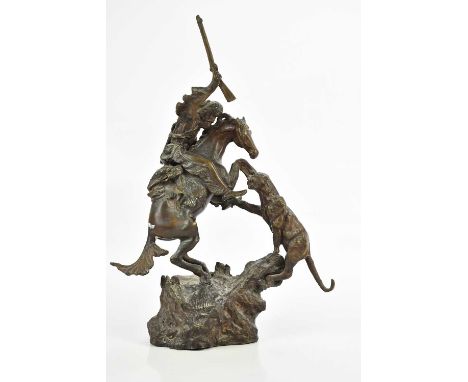 A bronze figure group of a mountain man on horseback and mountain lion, height 42cm.