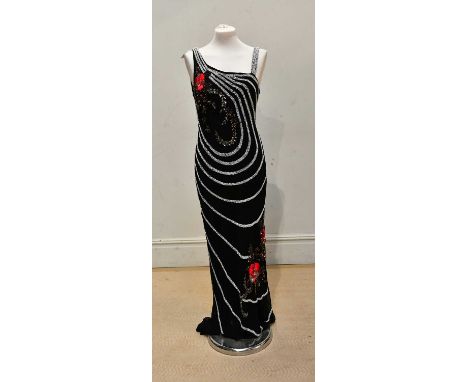 GOYA, LONDON; a full length vintage black silk sleeveless lined dress, with white bead geometric detail design embellished wi