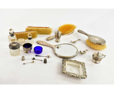 GEORGE UNITE; a George IV hallmarked silver caddy spoon, Birmingham 1827, a further Georgian hallmarked silver caddy spoon, a