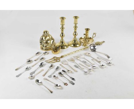 A small quantity of assorted brass and silver plate including candlesticks, a brass Buddha, assorted flatware, etc (qty).
