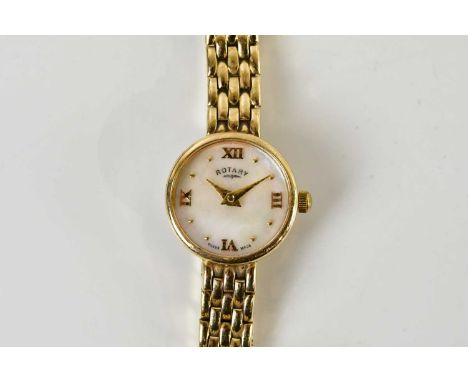 ROTARY; a lady's vintage 9ct yellow gold wristwatch, with Roman numerals and dot markers to the mother of pearl dial, approx 