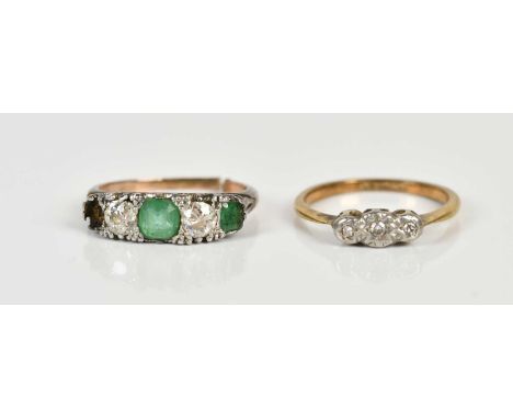 A late Victorian yellow metal diamond and emerald four stone dress ring (originally five stone), each diamond approx 0.25ct, 