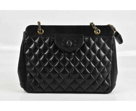 CHANEL; a 1960s/70s vintage black calfskin leather diamond quilted handbag, with front flap detail with interlocking CC logo,