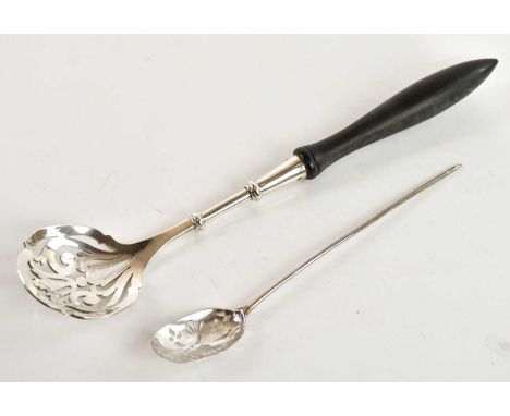 A Georgian white metal mote spoon, length 14cm, with an Elkington &amp; Co hallmarked silver ladle with pierced bowl and turn