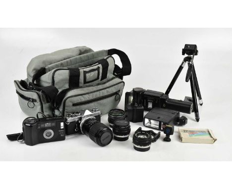 OLYMPUS; an Olympus OM-1n 35mm film camera, with four lenses,including Sigma 60mm-200mm f4-f5.6, Olympus 50mm f1.8, Hanimex 2