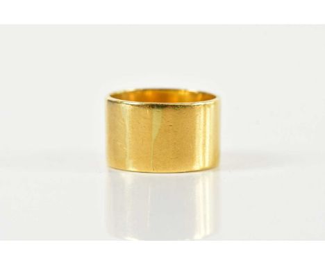 A broad 18ct yellow gold wedding band, size P, approx 12g.Condition Report: The ring has not been resized. Light surface scra