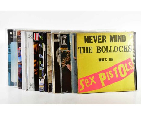 A collection of vinyls, including Joy Divison Leigh Rock Festival 1979, a signed copy of Ultravox The Collection, The Beatles