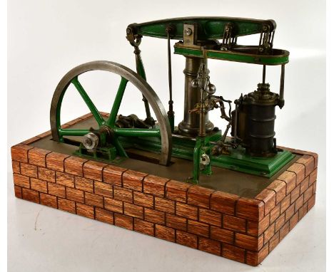 A large scratch built live steam vertical engine, in the form of a mining shaft pump, on wooden plinth, length 45cm.