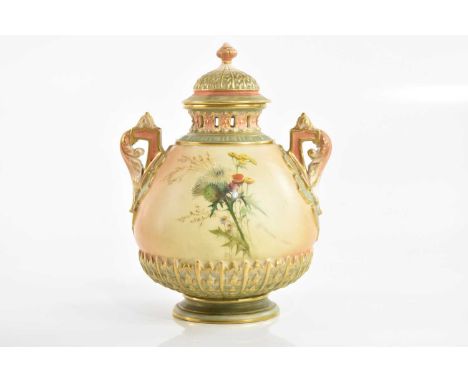 ROYAL WORCESTER; a hand painted twin handled lidded vase, decorated with thistles, height 19cm.