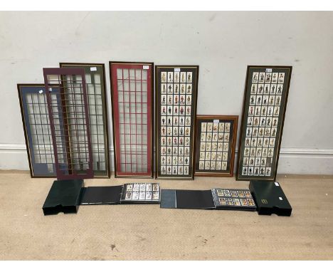 A collection of framed cigarette cards, mainly comprising uniforms of the Territorial Army, with three spare frames (qty).