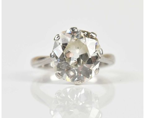 An impressive platinum diamond solitaire ring, the claw set stone weighing approx. 7.7cts, size K 1/2, approx 7.3g.Condition 