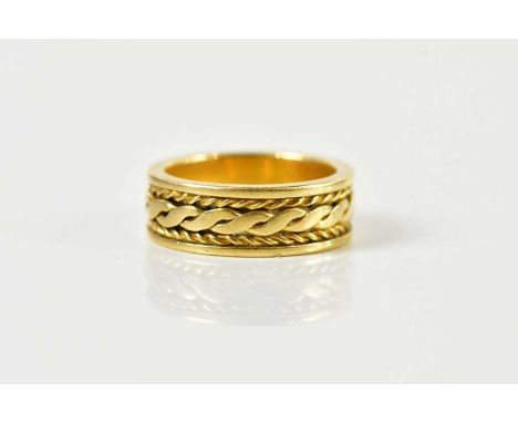 An 18ct broad yellow gold wedding band, size K, approx 8g.