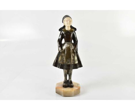 X JOSEPH D'ASTE (1881-1945); a patinated bronze and ivory figure representing a Dutch girl, on octagonal plinth base, the bas