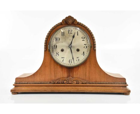 A modern mahogany cased Napoleon hat mantel clock, with silvered dial set with Arabic numerals, height 29cm.