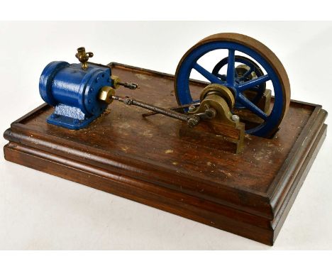 A scratch built live steam single piston engine, on pitch pine base, overall length 47cm. 