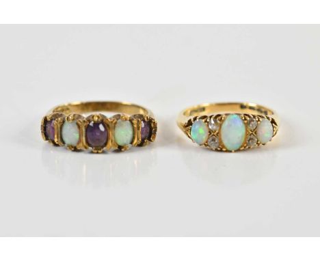 A yellow metal diamond and opal set seven stone dress ring, size K 1/2, and a 9ct gold five stone dress ring, size M 1/2, com
