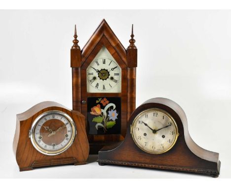 An early 20th century oak Napoleon hat shaped mantel clock, length 41cm, a walnut cased mantel clock and an American type exa