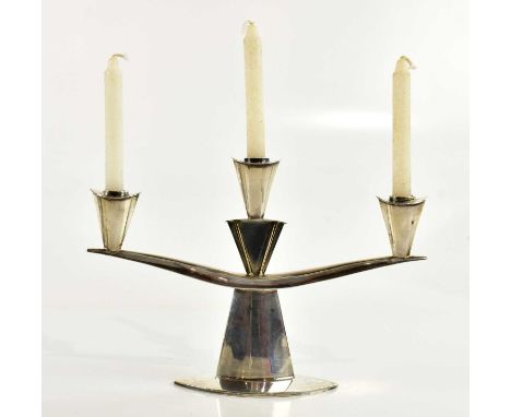 HARROW SCHOOL OF ART; an Elizabeth II Brutalist hallmarked silver three branch candelabrum, London 1964, height 15cm, approx 