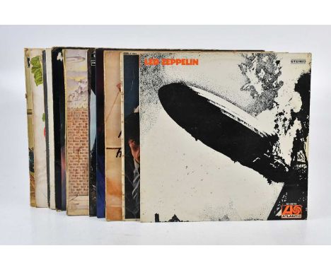 A collection of vinyl records including Led Zeppelin, Rolling Stones, Elton John, Deep Purple, The Animals, etc.