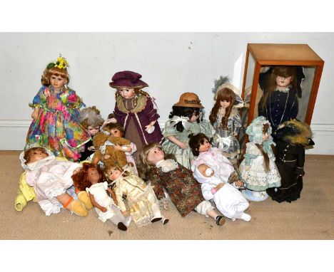 A Sasha type doll, height 40cm, with a collection of thirteen modern collectors' dolls including a doll in Victorian style dr