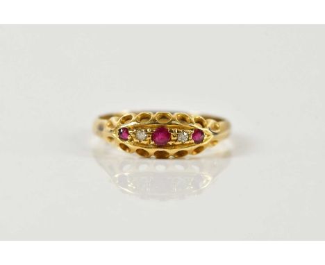 A yellow metal ruby and diamond five stone graduated ring, size P, approx 2.2g.Condition Report: Please note, the ring has be