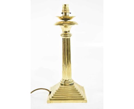 A brass fluted column table lamp, on stepped square base, height 40cm.Condition Report: The item or items in this lot are sol