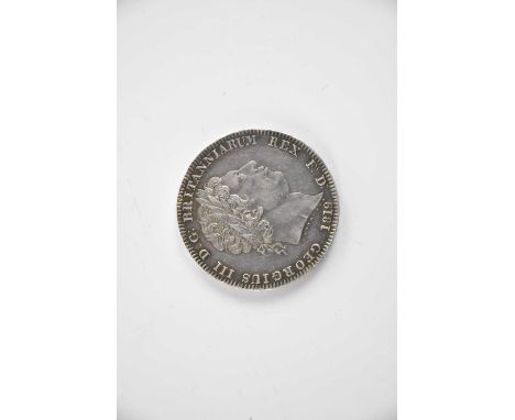 A George III silver crown, 1819, with 'Anno Regni LIX' border.Condition Report: We offer no opinion on grade; minor impact ma