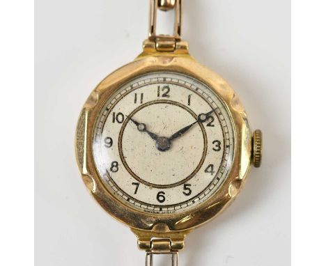 A vintage 9ct yellow gold wristwatch, with Arabic numerals to the dial and with sprung bracelet (af).
