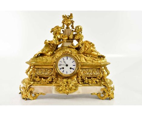 A large and impressive late 19th century French white marble and ormolu mounted figural mantle clock with eight-day movement 